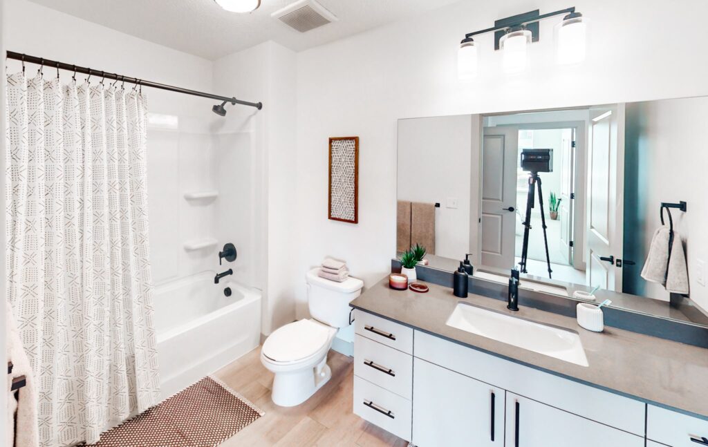 Luxury apartment bathroom with vanity & shower