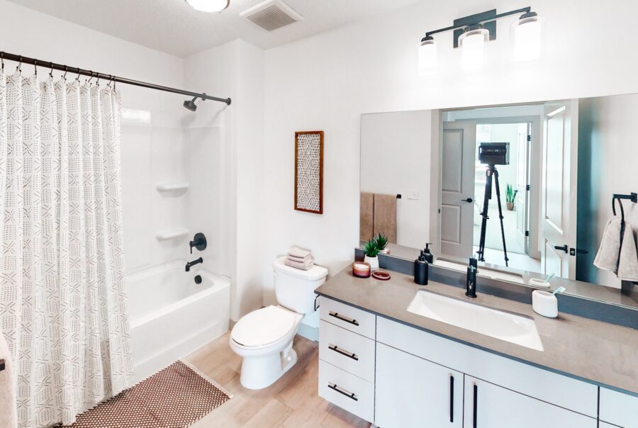 Luxury apartment bathroom with vanity & shower